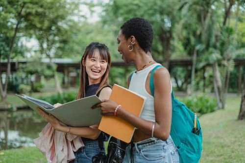 Female student with backpack on campus — illustrating study-abroad consulting and deposits