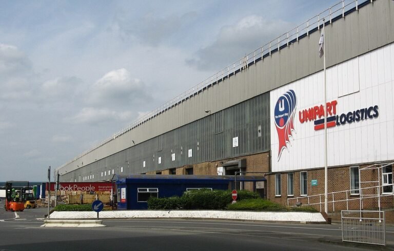Logistics warehouse, illustrating project termination and company dissolution